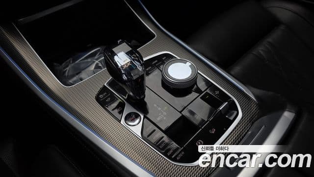 BMW X5 2022 — ფოტო 16/33