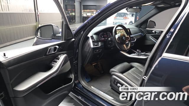 BMW X5 2022 — ფოტო 22/33