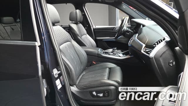 BMW X5 2022 — ფოტო 25/33