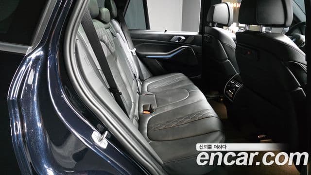 BMW X5 2022 — ფოტო 24/33