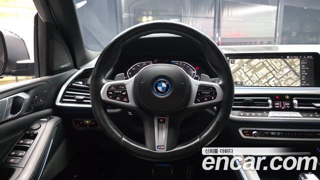 BMW X5 2022 — ფოტო 11/33
