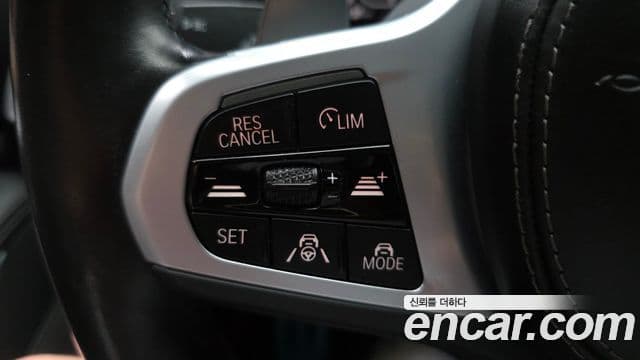 BMW X5 2022 — ფოტო 10/33