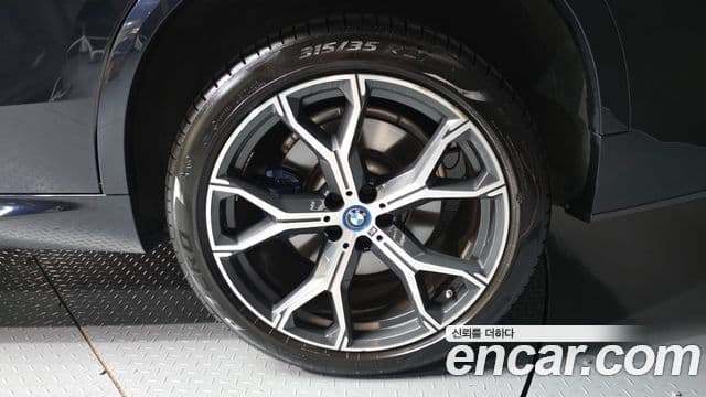 BMW X5 2022 — ფოტო 4/33