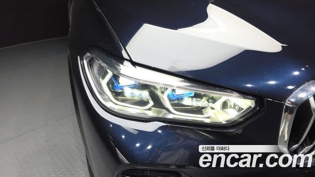 BMW X5 2022 — ფოტო 6/33