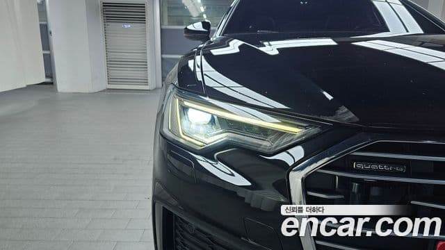 Audi A6 2021 — ფოტო 15/31