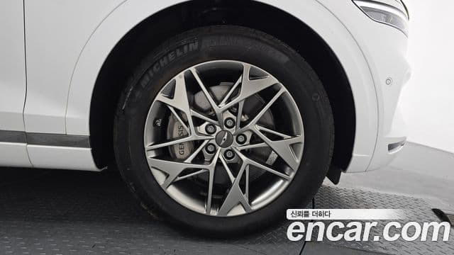 Genesis GV70 2023 — ფოტო 7/32