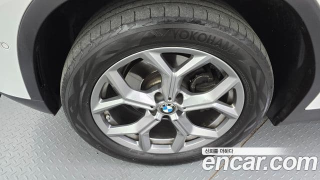 BMW X4 2023 — ფოტო 14/20