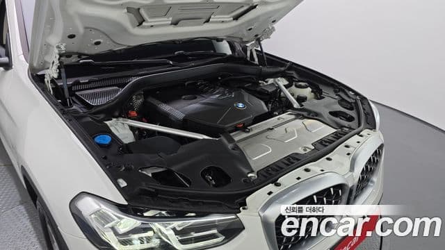BMW X4 2023 — ფოტო 10/20