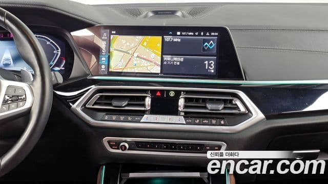 BMW X5 2023 — ფოტო 13/20
