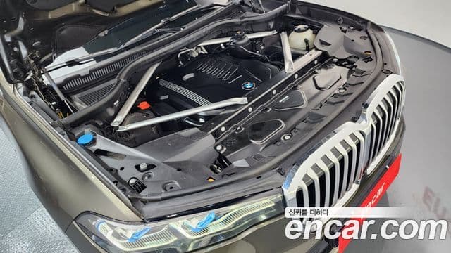 BMW X7 2022 — ფოტო 6/20