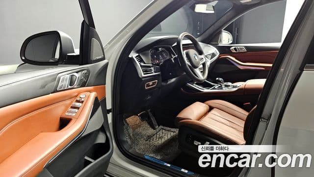 BMW X7 2022 — ფოტო 13/20