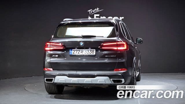 BMW X5 2022 — ფოტო 4/20