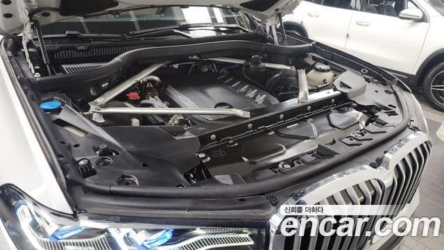 BMW X7 2022 — ფოტო 6/20