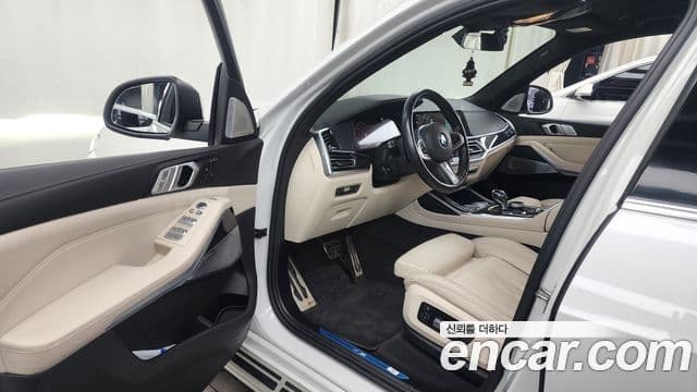 BMW X7 2022 — ფოტო 10/20