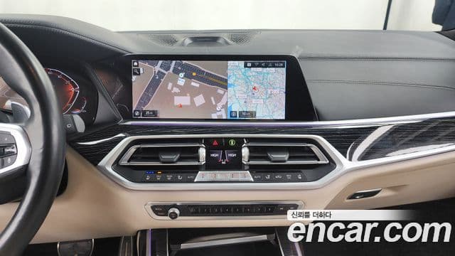 BMW X7 2022 — ფოტო 14/20
