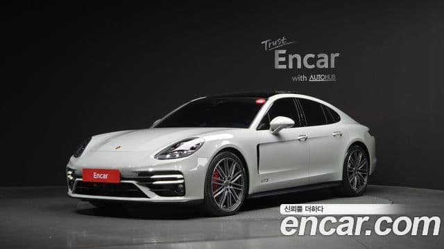 Porsche Panamera 2024 — Фото 1/20