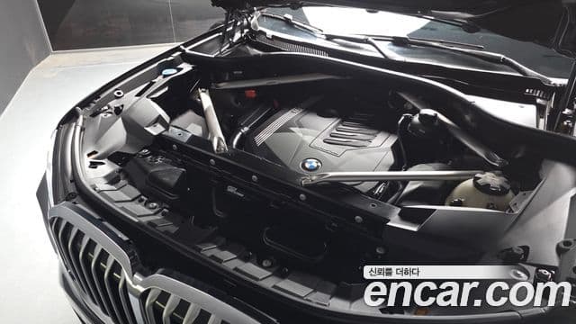 BMW X7 2020 — ფოტო 6/20