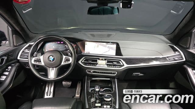 BMW X7 2020 — ფოტო 7/20