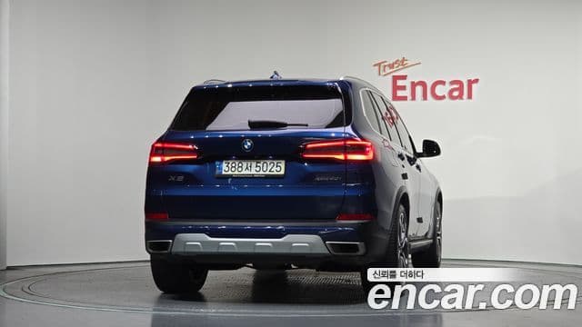 BMW X5 2021 — ფოტო 4/20