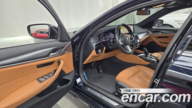 BMW 5 Series 2023 — ფოტო 10/20