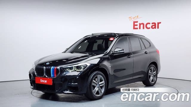 BMW X1 2022 — ფოტო 1/20