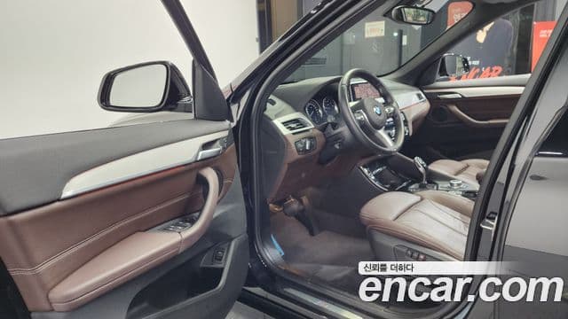 BMW X1 2022 — ფოტო 10/20