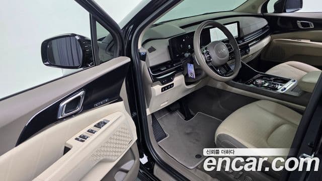 Kia Carnival 2023 — ფოტო 13/20
