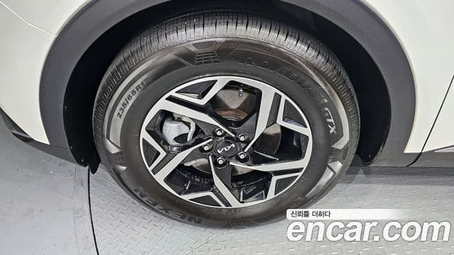 Kia Sportage 2021 — ფოტო 5/20