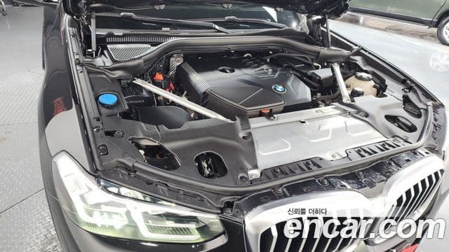 BMW X3 2021 — ფოტო 6/20