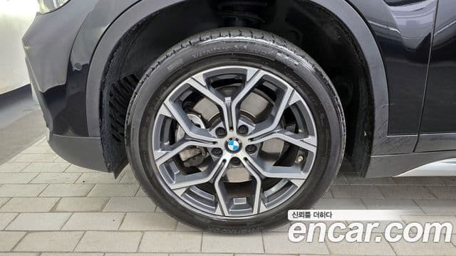 BMW X1 2021 — ფოტო 19/20