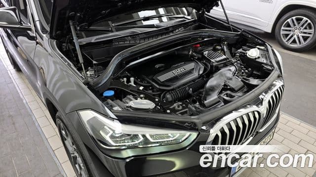 BMW X1 2021 — ფოტო 14/20