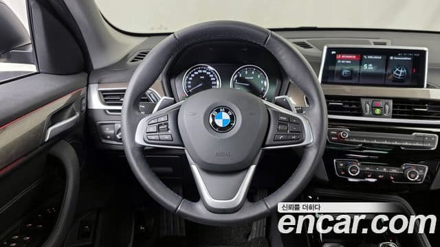 BMW X1 2021 — ფოტო 7/20