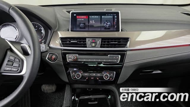 BMW X1 2021 — ფოტო 8/20