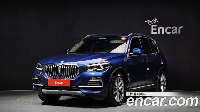 BMW X5 2019 — Фото 1/20