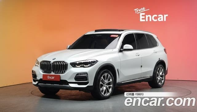 BMW X5 2019 — Фото 1/20