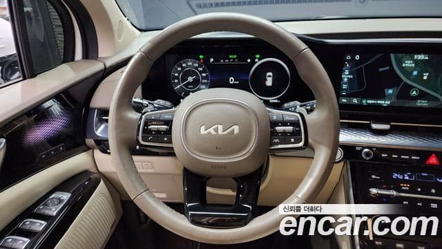 Kia Carnival 2021 — ფოტო 13/20
