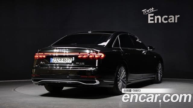 Audi A8 2023 — Фото 2/20