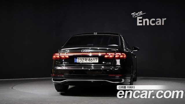 Audi A8 2023 — Фото 4/20