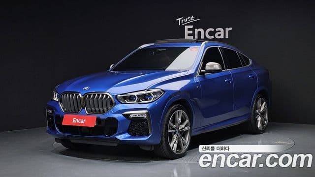 BMW X6 2020 — Фото 1/20