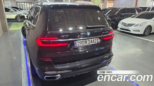 BMW X7 2023 — ფოტო 4/20