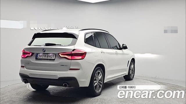 BMW X3 2021 — ფოტო 1/20