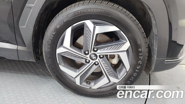 Hyundai Tucson Hybrid 2021 — Photo 24/32