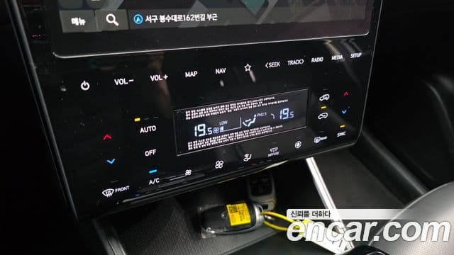 Hyundai Tucson Hybrid 2023 — ფოტო 3/30