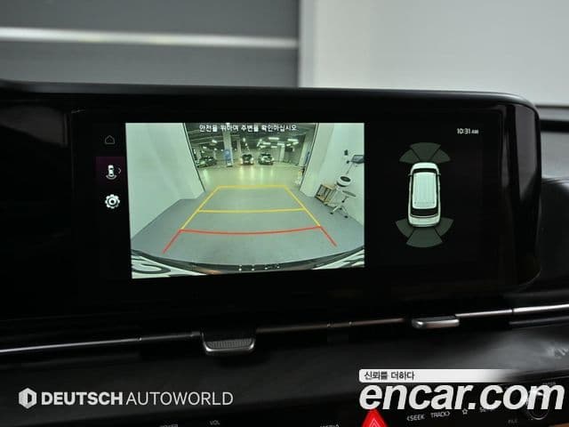 Kia Carnival 2021 — ფოტო 13/19