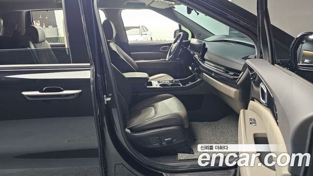 Kia Carnival 2024 — ფოტო 18/32