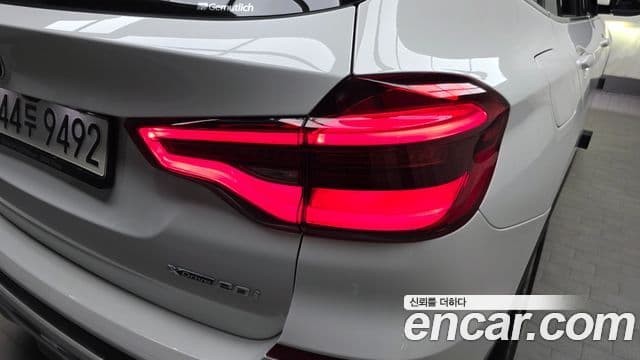 BMW X3 2021 — ფოტო 13/32