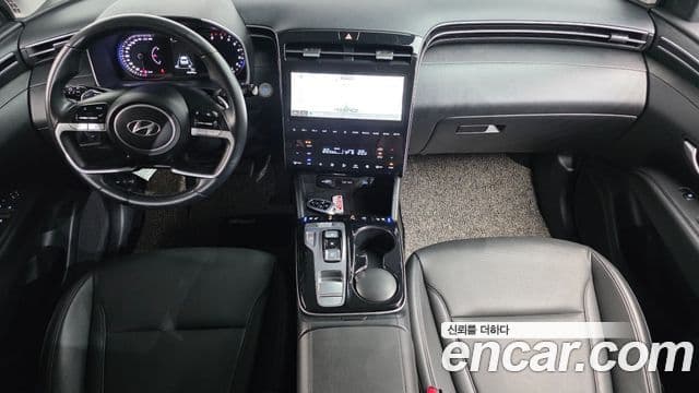 Hyundai Tucson Hybrid 2021 — ფოტო 18/20