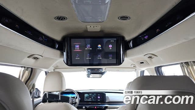 Kia Carnival 2021 — ფოტო 19/20