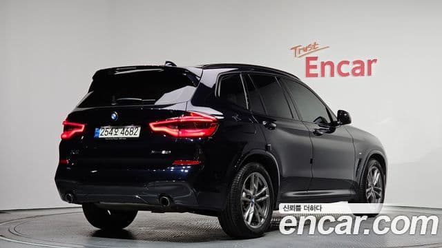BMW X3 2021 — ფოტო 1/20