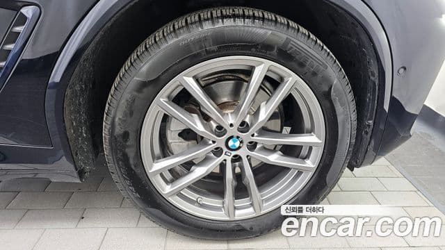 BMW X3 2021 — ფოტო 18/31